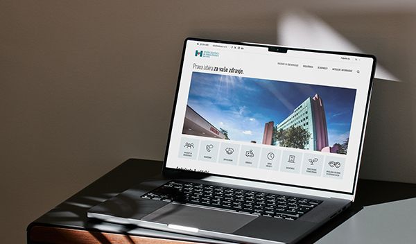 Laptop displaying the home page of General Hospital in Nova Gorica.